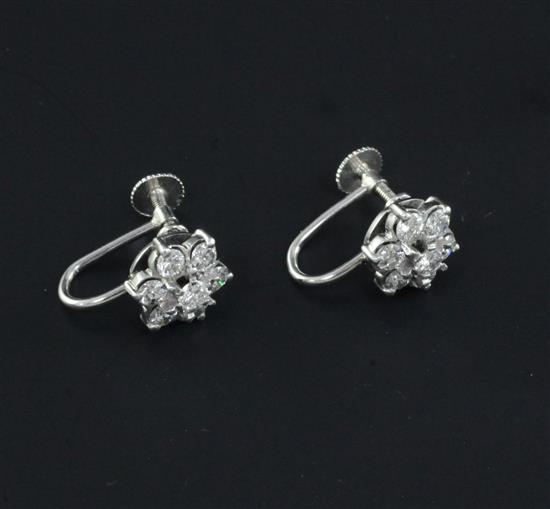 A pair of 9ct white gold and diamond cluster earrings, diameter 9mm.
